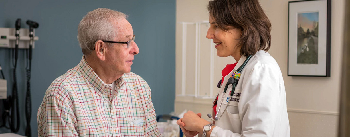 elizabeth-buchbinder-consults-with-her-melanoma-patient1440x584.jpg